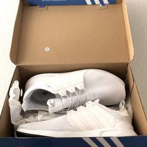 Authentic/Used Men’s all white Adidas shoes